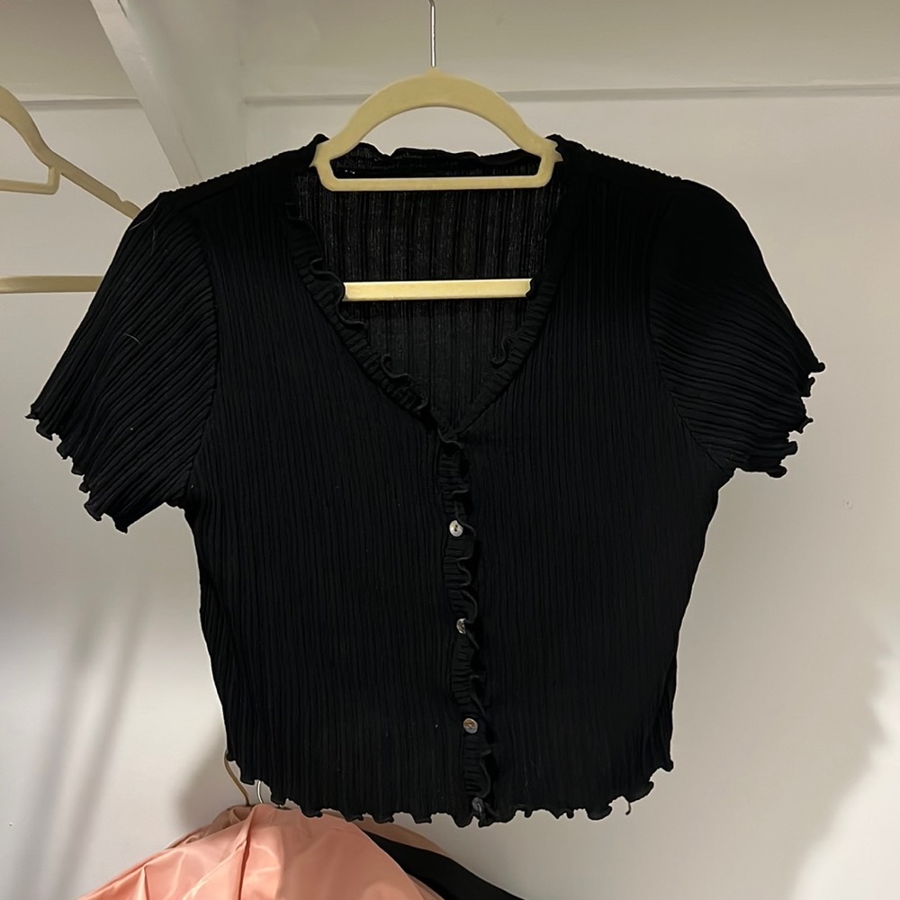 Black ruffled top